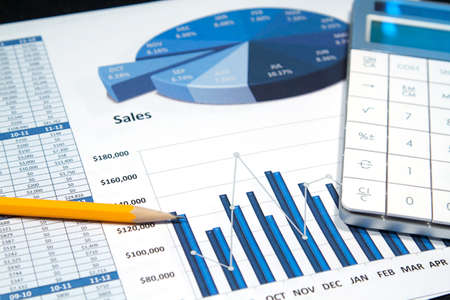A business strategy using color charts and a calculatorの写真素材