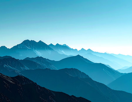 Gazing across an endless expanse of mountain ranges, each layer fades into a softer shade of blue, creating a profound sense of peace and tranquility. A perfect visual for concepts of depth, perspective, and serene journeys.の素材
