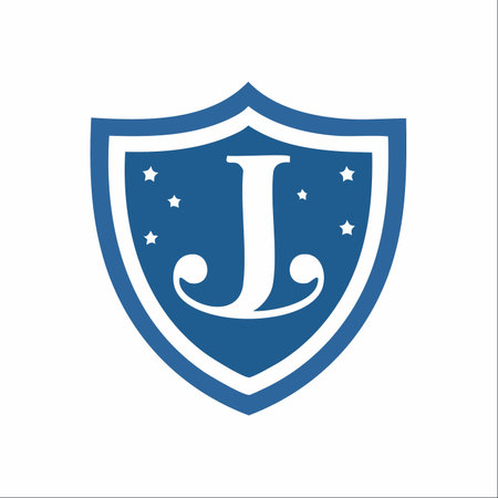 A classic and elegant emblem featuring the initial 'J' set within a protective blue shield.のイラスト素材
