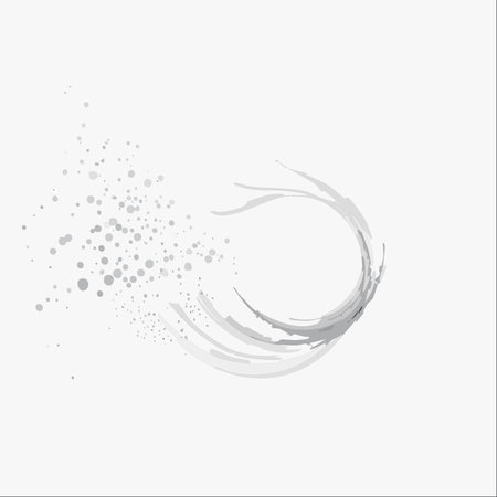 An elegant, abstract illustration depicting a dynamic swirl of gray brushstrokes transforming into a spray of dispersing particles.のイラスト素材