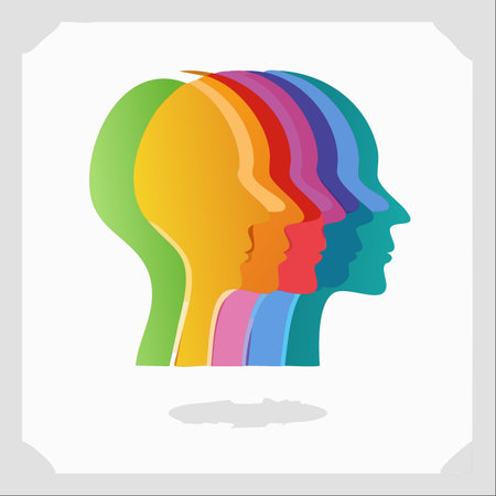 A vibrant illustration of multiple overlapping human head silhouettes in a spectrum of colors.のイラスト素材
