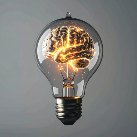 A glowing brain illuminates the inside of a classic light bulb, symbolizing a powerful moment of breakthrough.の素材