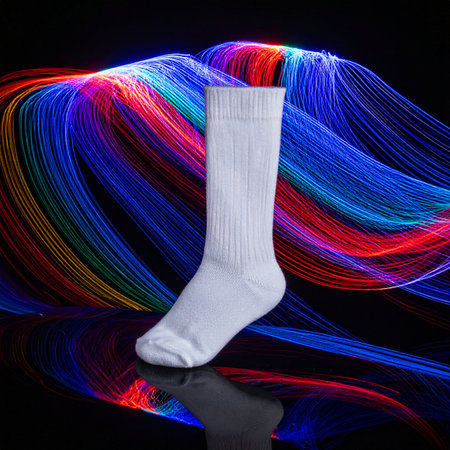 A simple white sock is transformed into a work of modern art, standing against a backdrop of swirling, energetic light trails.の素材