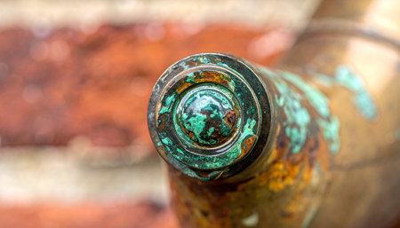 A macro view captures the intricate beauty of time's passage on a copper pipe.の素材