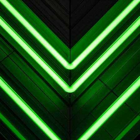 Pulsating green neon lights form a dynamic chevron pattern, creating a sense of forward motion and futuristic energy.の素材