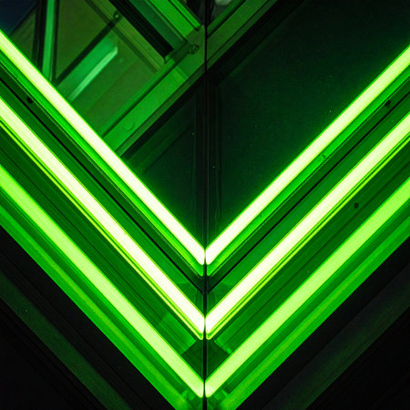 Sharp, vibrant green neon lines converge, forming a dynamic arrow that points towards the future.の素材