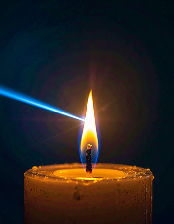A brilliant blue laser beam cuts through the darkness, precisely striking the warm, flickering flame of a candle.の素材