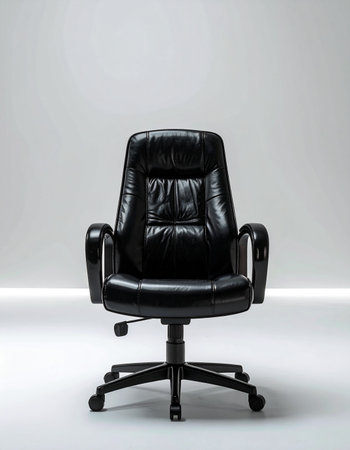 An empty executive chair sits under a spotlight, waiting for the next leader. This image represents opportunity, vacancy, and the potential for new beginnings in a corporate setting.の素材