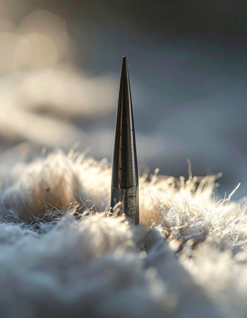 A powerful symbol of force and danger rests peacefully in a bed of impossibly soft down.の素材