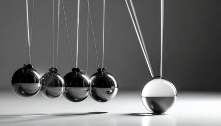 A single polished sphere is pulled back, poised to strike.の素材