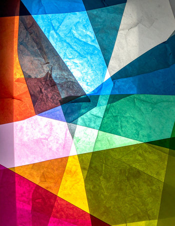 Light streams through a dynamic mosaic of overlapping, translucent colored sheets, creating an energetic abstract composition.の素材