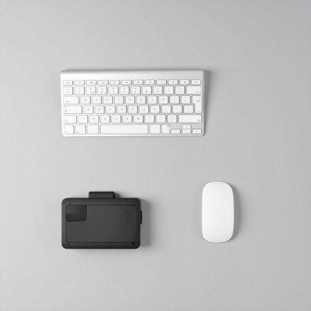 A clean, minimalist desk setup viewed from above.の素材
