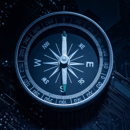 An analog compass rests on a complex digital circuit board, symbolizing the quest for clear direction and strategic guidance in the modern technological landscape.の素材