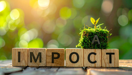 A small green sprout emerges from a moss-covered block, symbolizing how focused actions can create a significant positive impact.の素材