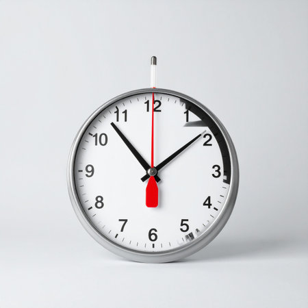 A classic analog clock hangs against a stark white background, its familiar face disrupted by a surreal digital glitch.の素材