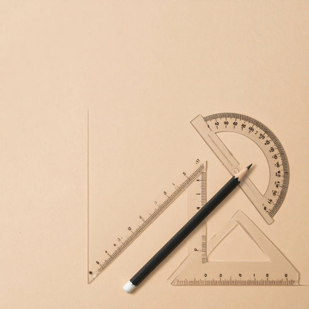 A clean, minimalist flat lay of essential drafting toolsの素材