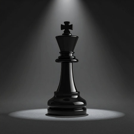In a moment of intense focus, a solitary black chess king stands under a single, dramatic spotlight.の素材