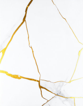A pristine white marble surface is elegantly fractured with veins of shimmering gold, reminiscent of the Japanese art of Kintsugi.の素材