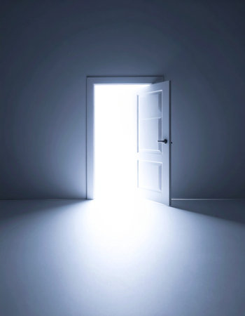 In a dimly lit, empty room, a slightly ajar door reveals a brilliant, pure white light pouring through the opening.の素材