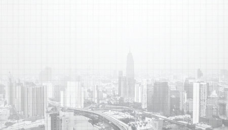 A sprawling metropolis awakens, veiled in a soft, ethereal white fog.の素材