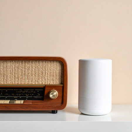 A classic wooden vintage radio sits beside a sleek, modern smart speaker, showcasing the evolution of audio technology.の素材