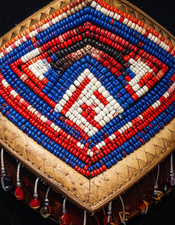 A macro shot reveals the stunning detail of a traditional tribal artifact.の素材