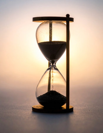 As the last grains of sand fall, a moment passes into history.の素材