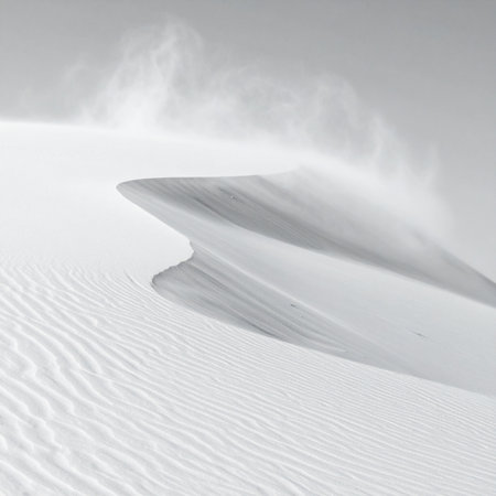 A powerful gust of wind sculpts the crest of a pristine white sand dune, sending plumes of fine grains into the air.の素材