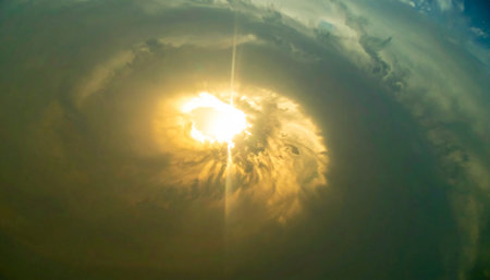 From the silent vantage point of orbit, a catastrophic event unfolds on the planets surface. A blinding flash of light and energy erupts through the atmosphere, signaling a moment of immense destruction and irreversible change. This powerful image captures the terrifying beauty of a global-scale disaster, perfect for themes of apocalypse, conflict, or cosmic threats.の素材