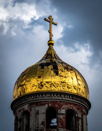 This image captures the stark contrast between the divine and the tempestuous. The gleaming gold of the church dome, a beacon of spirituality, is framed by a brooding, cloudy sky, creating a powerful visual narrative of perseverance and belief.の素材