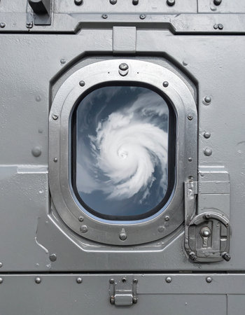 From the secure observation deck of a futuristic vessel, a massive hurricane churns below. This view from a reinforced porthole offers a safe but awe-inspiring perspective on natures immense and destructive power, symbolizing survival and climate change.の素材