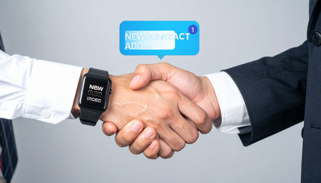 Two professionals finalize a significant agreement.の素材