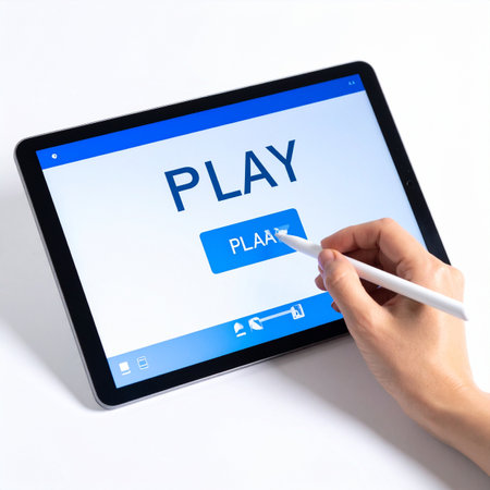 A user is about to begin an interactive experience, using a stylus to tap the 'play' button on a modern tablet.の素材