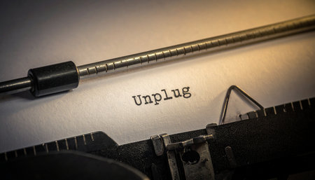 In a world of constant digital noise, a vintage typewriter offers a simple, powerful message: Unplug.の素材