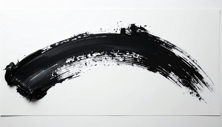 A single, bold stroke of black paint curves across a white surface, capturing a moment of raw, expressive energy.の素材