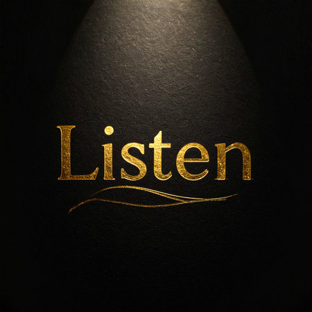In the quiet darkness, a single spotlight reveals a golden word: Listen.の素材