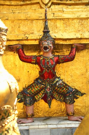 Buddhist temple keeper statue in the Grand Palace in Bangkokの写真素材