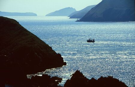 Fishing boat in bay, In the West of Ireland, irish, Dingle Bayの写真素材