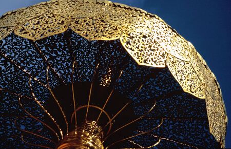 Golden umbrella in the  Doi Suthep monastery near Chiang Mai, Thailandの写真素材