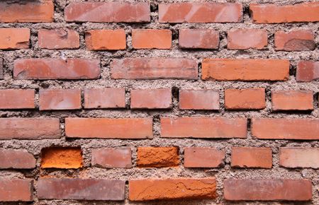Red brick wall in old town in Alsace, France