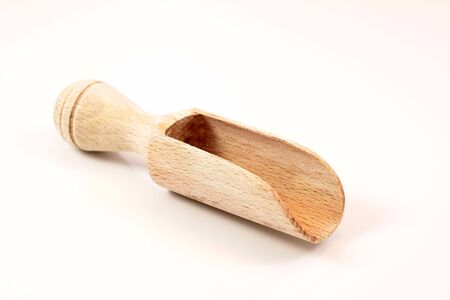 Small isolated wooden shovel with white backgroundの写真素材