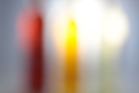 Three wine bottles with backlight and grey backgroundの写真素材