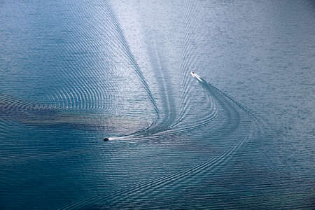 Boats on Lake Wakatipu from Bobs Peak, Queentown, Otago, South island,  New Zealandの写真素材