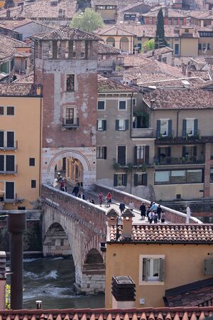 Bridge Ponte di Pietra over the river Etsch in the old town of Verona seen from the hill of San Pietro, Veneto, Italyのeditorial素材