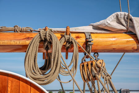 Masts and ropes of a large sailing ship in Amaliehaven, Copenhagen, Denmarkの写真素材