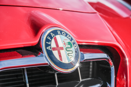 Alfa Romeo logo on red sports carのeditorial素材