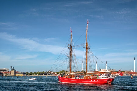 Big red old sailing ship in Amaliehaven in Copenhagen, Denmarkの写真素材