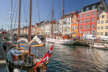 Old boats and colorful houses in Nyhavn in Copenhagen, Denmarkのeditorial素材