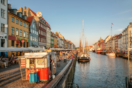 Promenade at Nyhavn in Copenhagen, Denmark in the evening lightのeditorial素材