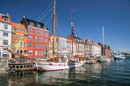 Old boats and colorful houses in Nyhavn in Copenhagen, Denmarkのeditorial素材
